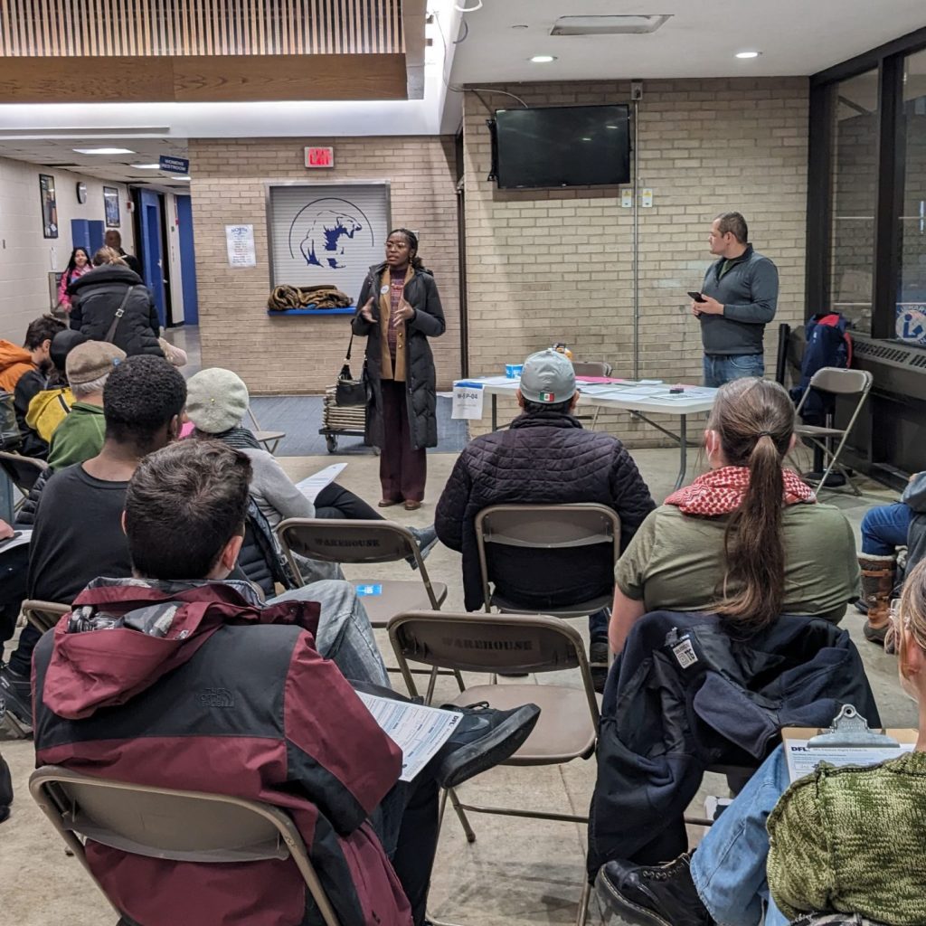 Esther talking to a group of people